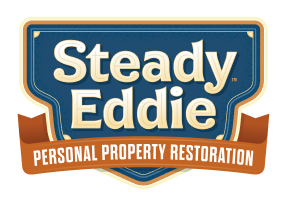 Steady Eddie logo with a blue and tan shield design and a brown ribbon that reads "Personal Property Restoration.